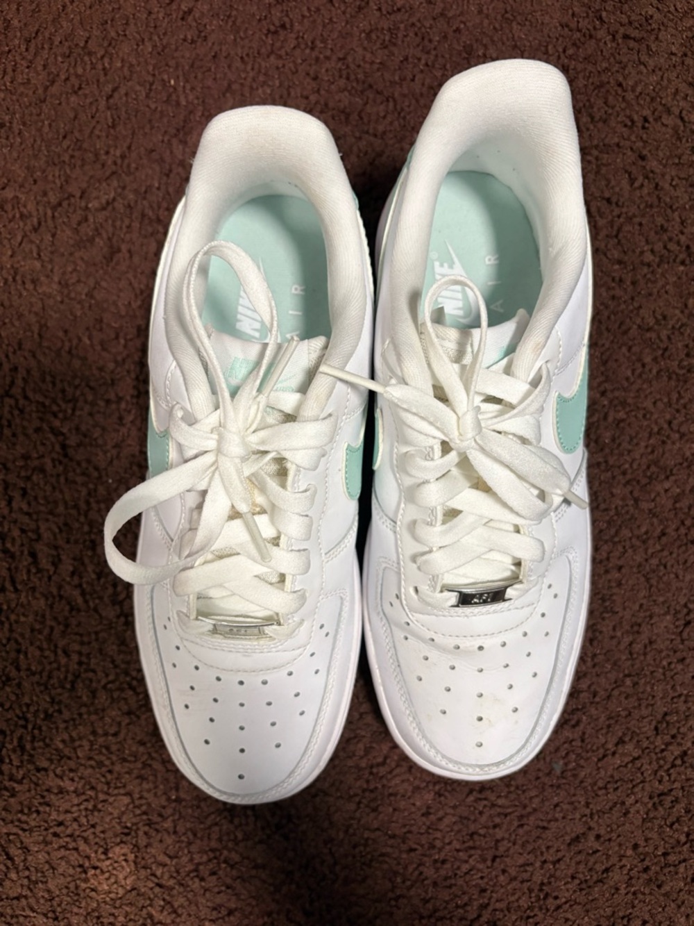 Nike Women’s White Sneakers with Mint Accent